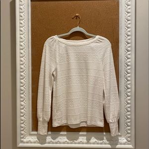 Women’s white, embroidered, long sleeve.
